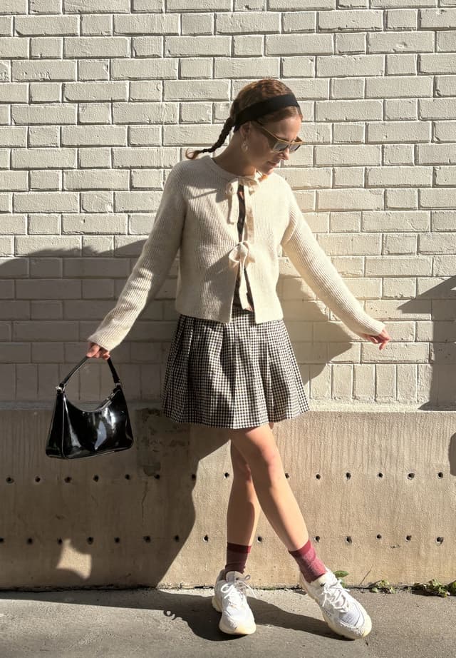 Chaqueta de punto con bolso de mano